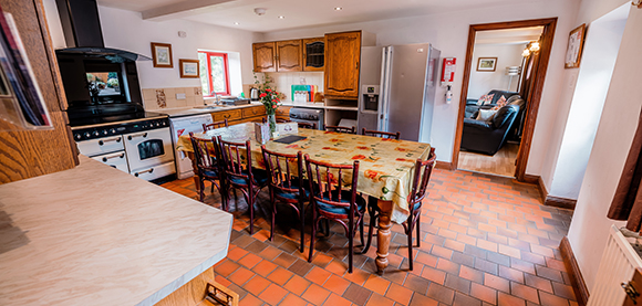 Pine Cottage KItchen with stove
